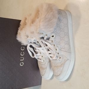 Gucci Guccissima leather high top sneakers with fur trim